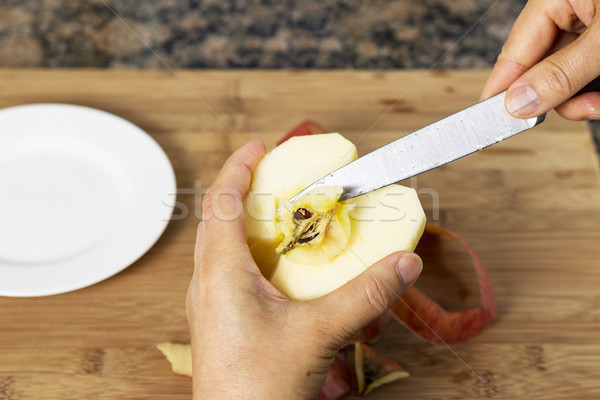 Removing Pit from Apple with Knife  Stock photo © tab62