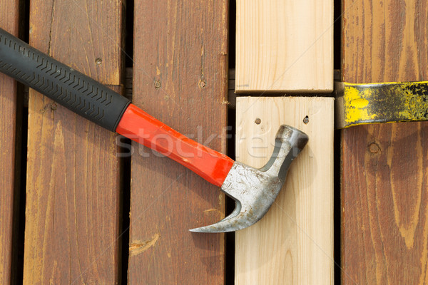 Aligning New Wood into Cedar Deck  Stock photo © tab62