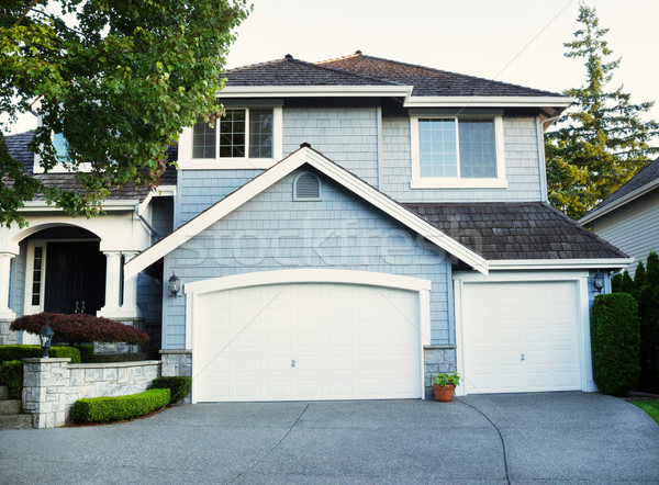 Fresh paint and stain job on exterior of modern home  Stock photo © tab62