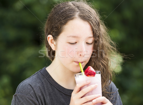 Young Girl Tasting Freshly Made Milkshake  Stock photo © tab62