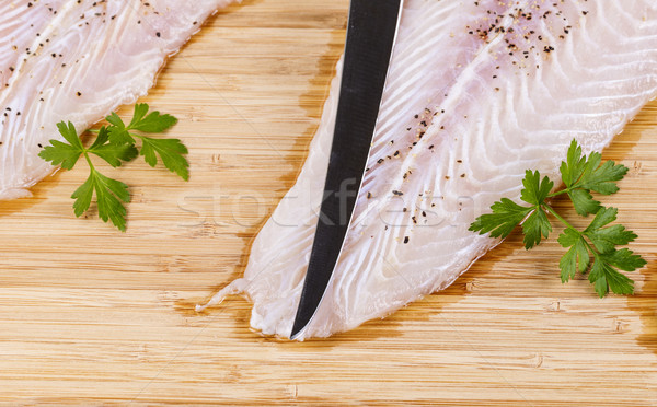 Clean and Seasoned Fish Fillets with sharp knife  Stock photo © tab62
