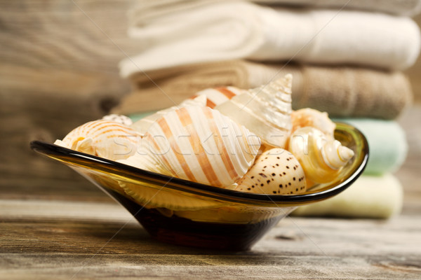 Seashells and Towels on Rustic Wood  Stock photo © tab62