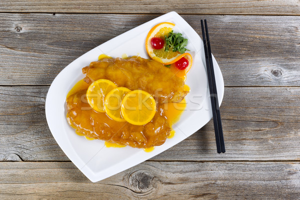 Bread coated fried chicken with lemon sauce ready to eat Stock photo © tab62