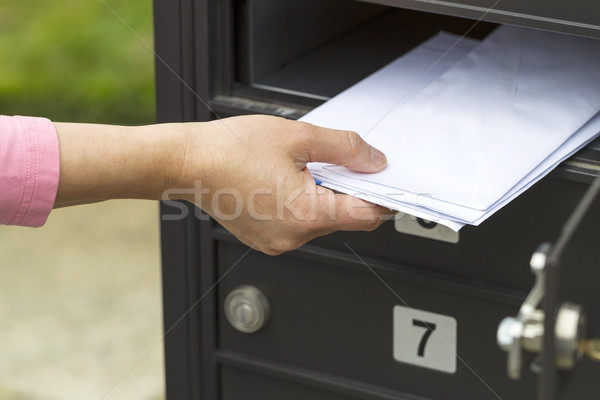 Putting up the mail  Stock photo © tab62