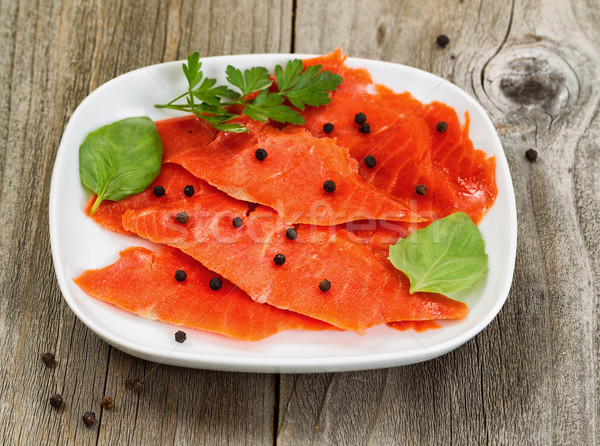 Cold smoked red salmon on plate ready to eat Stock photo © tab62