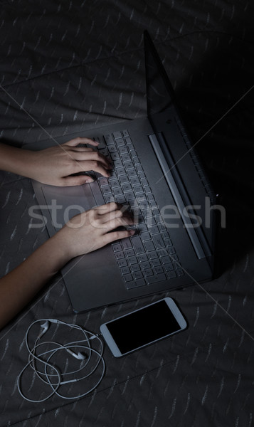 Using laptop computer during bedtime Stock photo © tab62