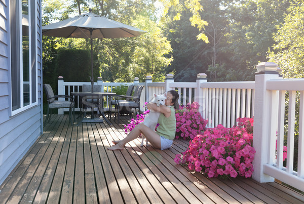 Mujer perro aire libre casa cubierta Foto stock © tab62
