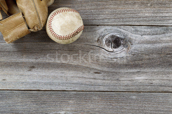 Old Baseball Mitt with used ball on rustic wood  Stock photo © tab62