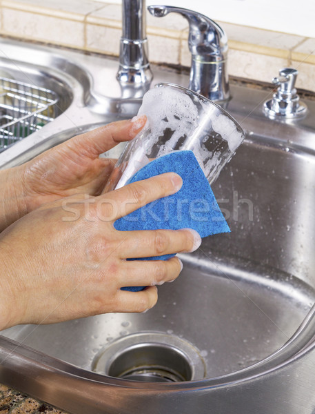 Female hands cleaning drinking glass Stock photo © tab62