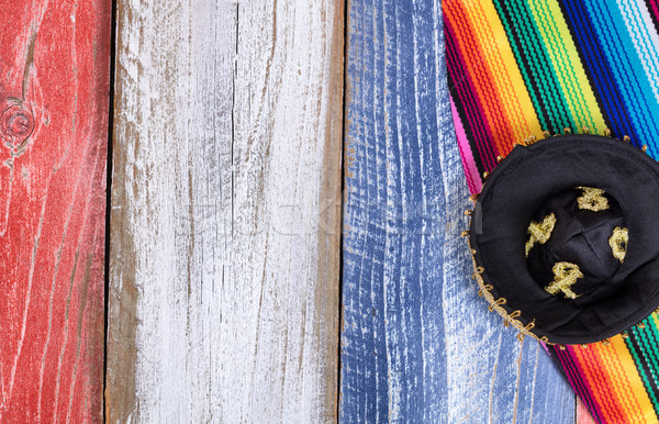 Mexican party hat and serape on painted rustic wooden boards in  Stock photo © tab62