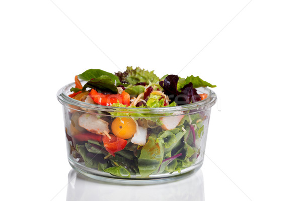 Fresh mixed salad in glass container isolated on white backgroun Stock photo © tab62