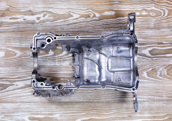 Defected aluminum car engine oil pan with cracks Stock photo © tab62