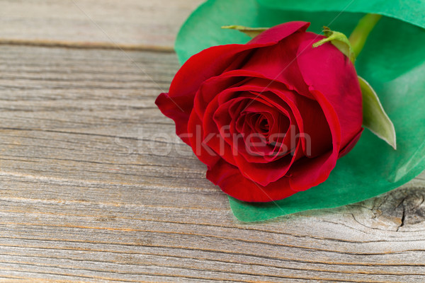 Happy Valentines day with single freshly cut red rose on rustic  Stock photo © tab62