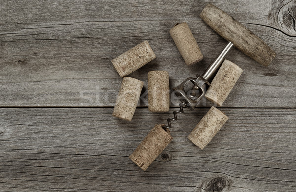 Rustic Wine Opener with used corks on aged wood  Stock photo © tab62