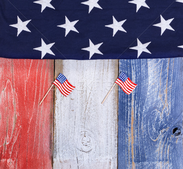 USA flags on rustic wooden boards painted in national colors Stock photo © tab62