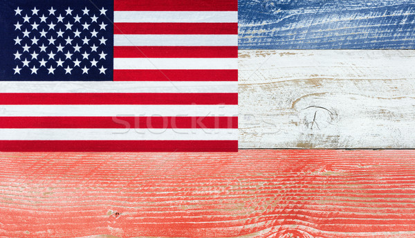 American flag with national colors painted on fading wooden boar Stock photo © tab62