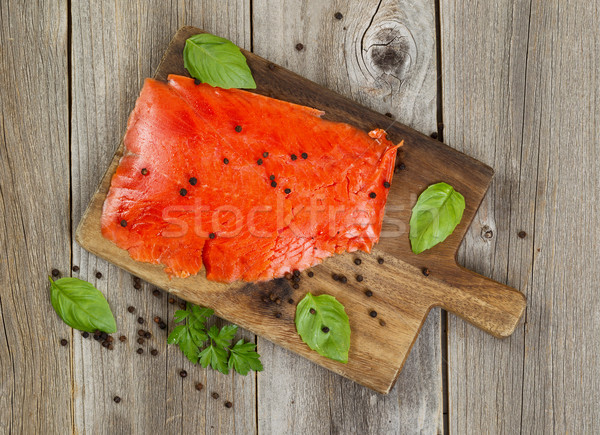 Cold smoke red salmon being prepared on wooden server board Stock photo © tab62