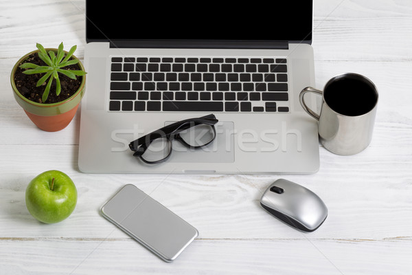 Clean and organized work space on white desktop Stock photo © tab62