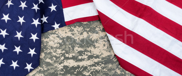 Cloth United States flag with military uniform in overhead view  Stock photo © tab62