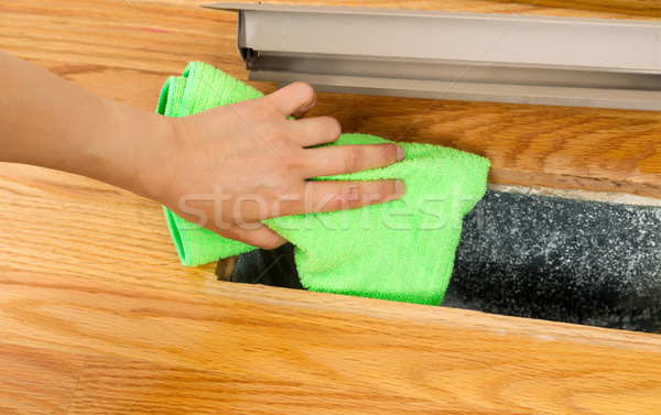 Cleaning Inside Heater Floor Vent with Microfiber Rag  Stock photo © tab62