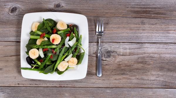 Overhead view of a nutritional fresh salad on rustic table  Stock photo © tab62