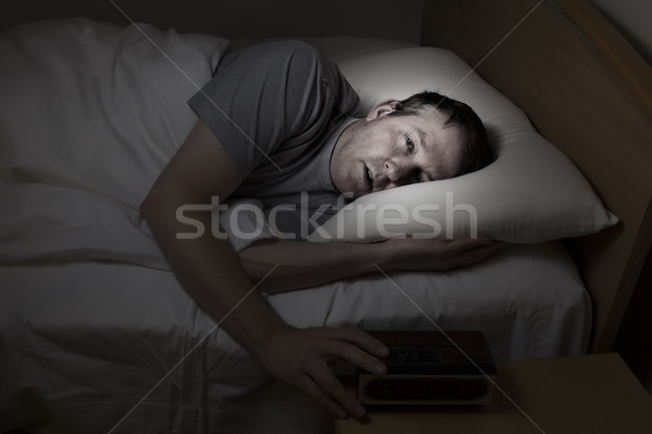 Stock photo: Mature man cannot get to sleep 