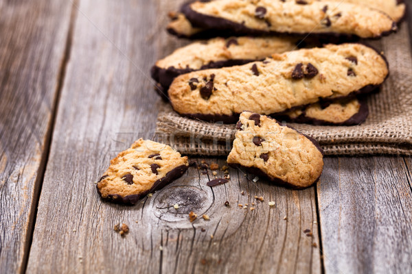 Homemade chocolate chip cookies in linen napkin on rustic wood Stock photo © tab62