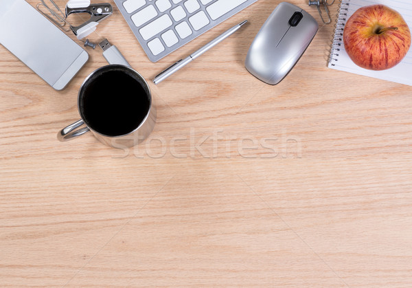 Oak wooden desktop with various office equipment on upper border Stock photo © tab62