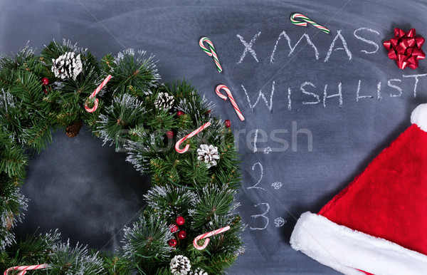 Erased black chalkboard with wreath and other Xmas items plus te Stock photo © tab62