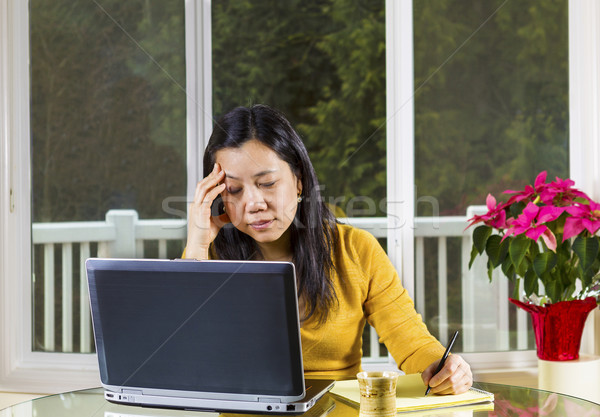 Mature woman stressed while working at Home  Stock photo © tab62