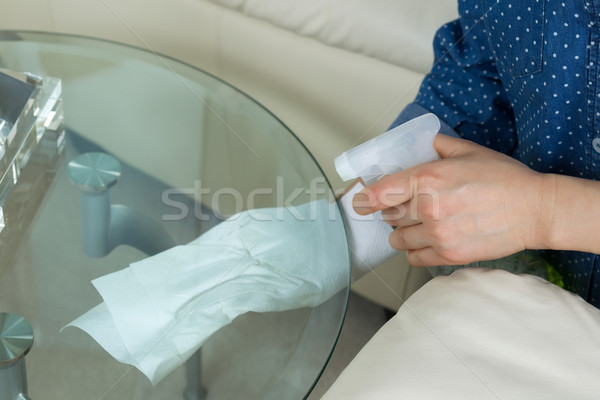 Cleaning underneath Glass End Table  Stock photo © tab62