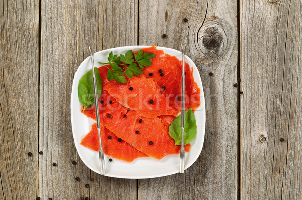 Fresh Cold smoked red salmon on plate  Stock photo © tab62