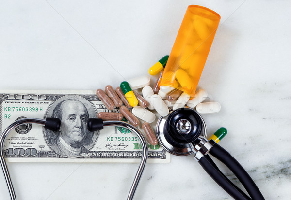 Medische kosten stethoscoop geld geneeskunde pillen Stockfoto © tab62