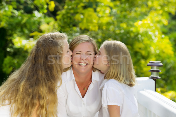 Mother expressing her happiness with her daughters  Stock photo © tab62