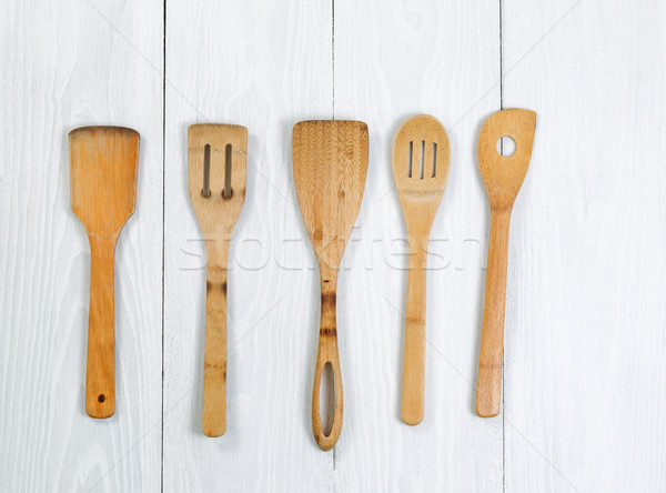 Traditional cookware on white wooden boards Stock photo © tab62