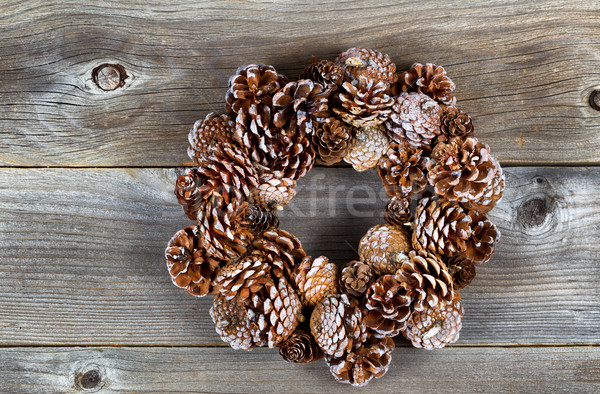 Christmas Pine Cone Wreath on Rustic Wood  Stock photo © tab62