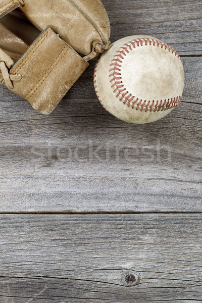Used baseball and weathered mitt on old wood Stock photo © tab62