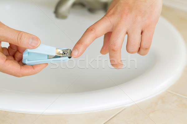Hand manicure with nail clippers Stock photo © tab62
