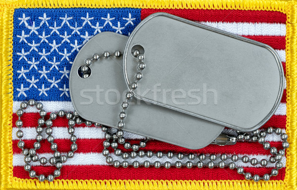 United States flag and ID tags in overhead view for Veterans or  Stock photo © tab62