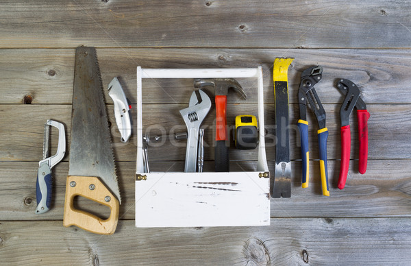Basic tools with Holder on weathered wood  Stock photo © tab62
