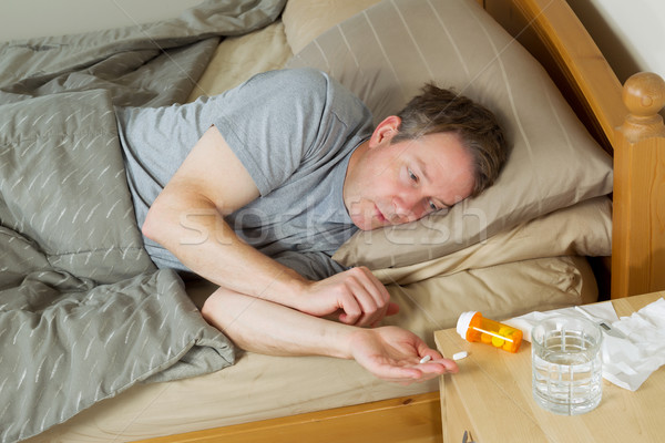 Homme mûr médecine pilule main horizontal photo [[stock_photo]] © tab62