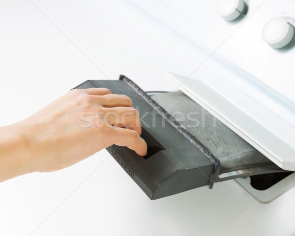 Preparing to Clean Air Filter Screen in Dryer Machine  Stock photo © tab62