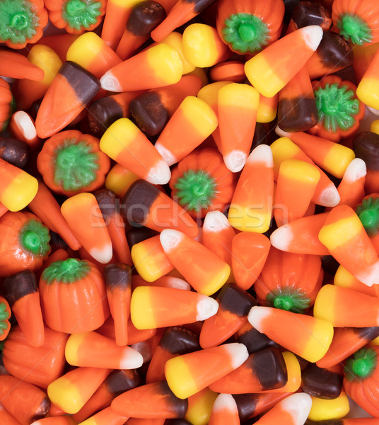 Filled frame of autumn holiday candy corn and pumpkin shapes  Stock photo © tab62