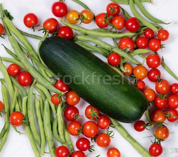 Freshly picked uncleaned vegetables on marble stone countertop  Stock photo © tab62