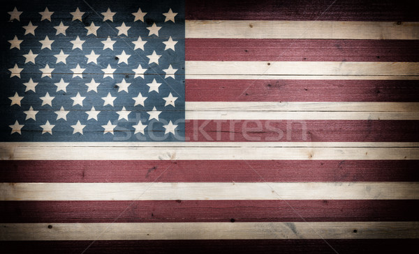  fading USA flag painted on faded wooden boards Stock photo © tab62