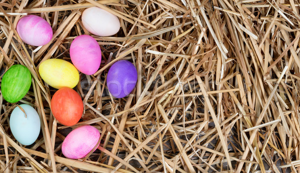 Színes tojások húsvét ünnep kéz keret Stock fotó © tab62
