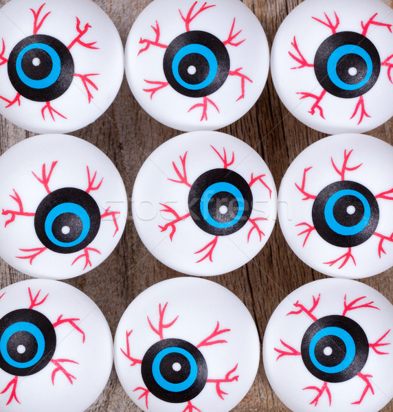Stock photo: Scary eyeballs for Halloween season on rustic wood 