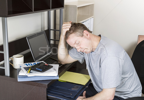 Mature Man getting Frustrated doing Personal Income Taxes  Stock photo © tab62