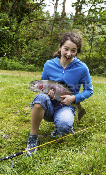 Happy Girl Fishing  Stock photo © tab62