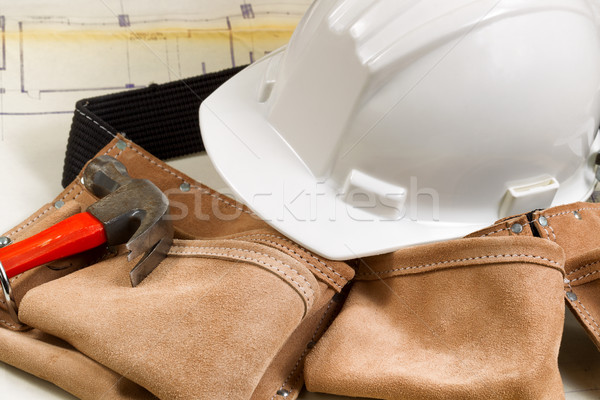 Construction contractor tools with blue print drawings in backgr Stock photo © tab62